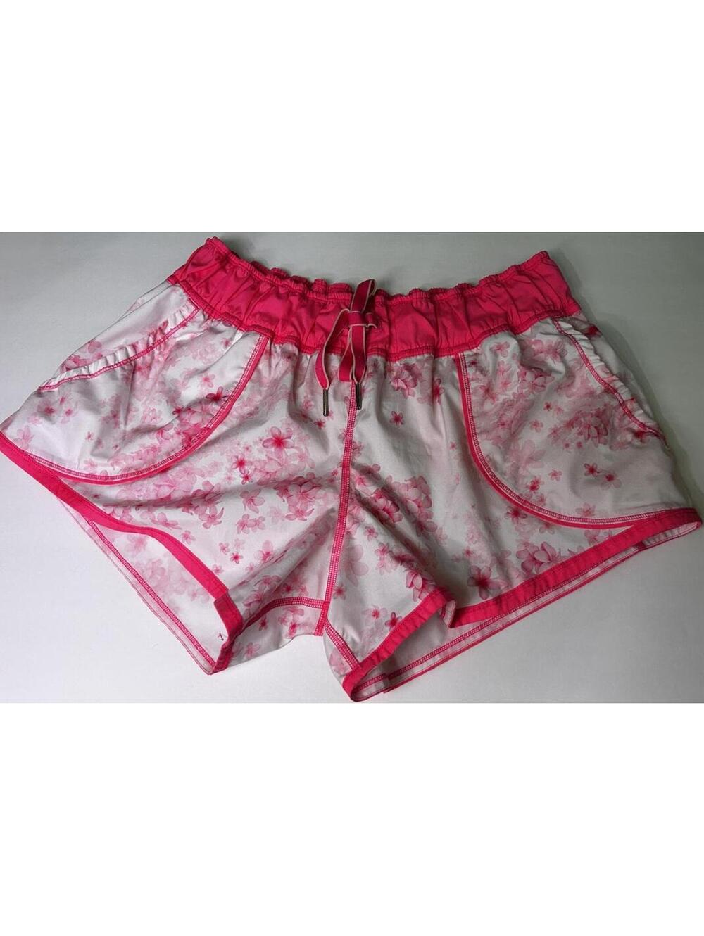 lululemon athletica  PINK AND WHITE FLORAL  SHORTS Size 12
